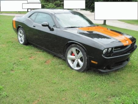 Well step right up and check out this beauty a 2009 Dodge Challenger that