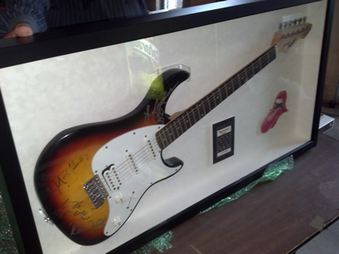 autographed stones guitar